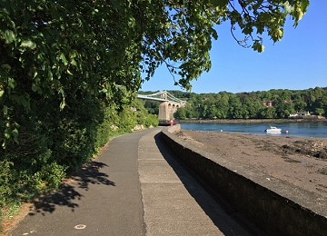 Belgian promenade and Menai Suspension bridge in Summer