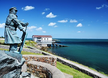 Dick Evans statue and Lifeboat station