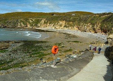 The beach at Porth Swtan as the tide goes out