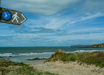 Anglesey Coastal Path sign at Porth Tywyn Mawr beach