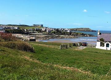 Cemaes bay from main road with Wylfa in background