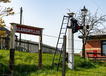 Llangwyllog Railway Station sign and signal