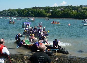 The annual raft race from Y Felinheli to Menai bridge raises lots of money for local charities